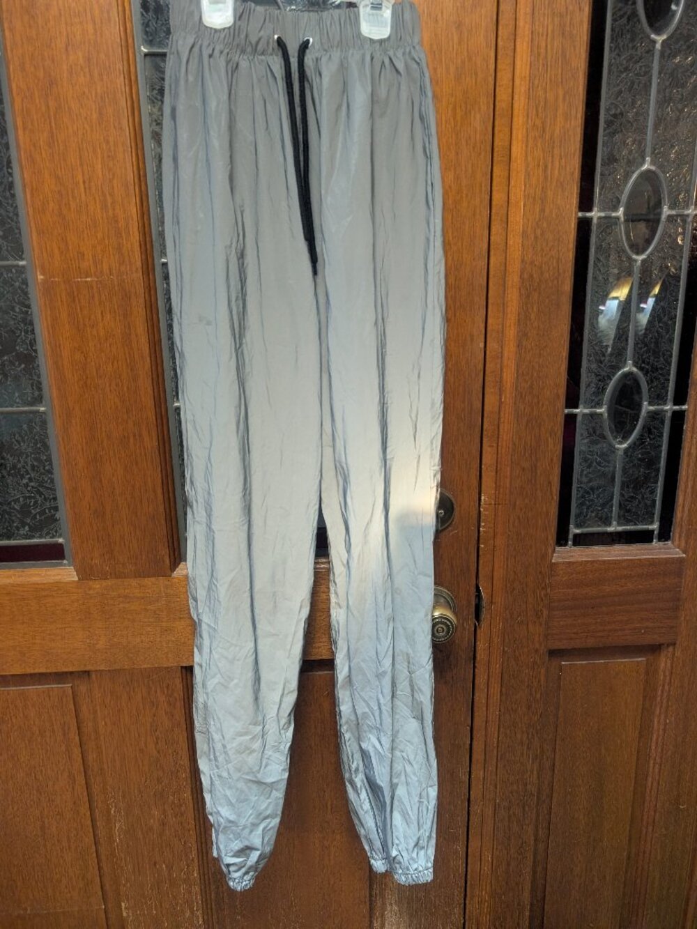 Womens highly reflective joggers, size Medium